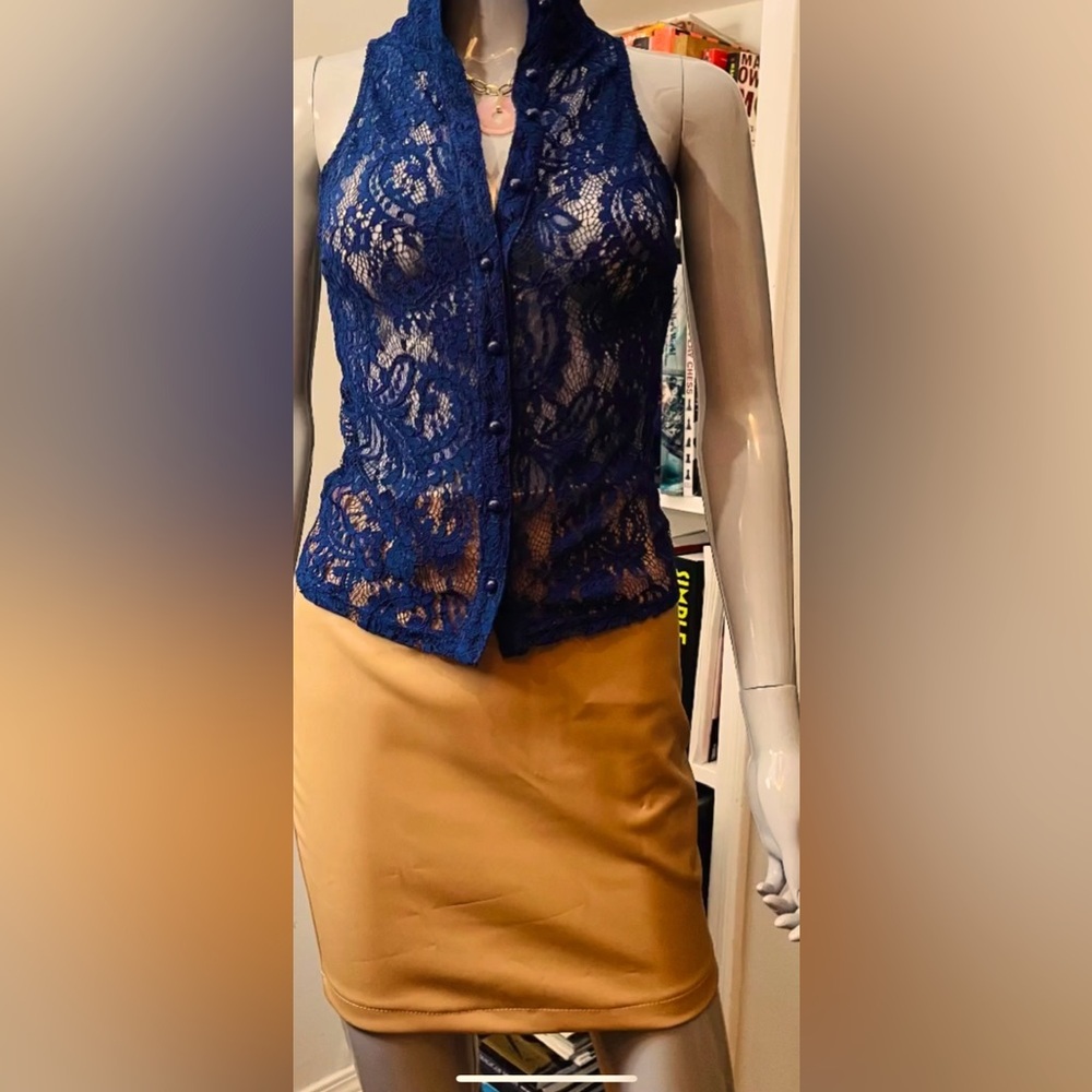 lace top, collar, and button front. Can be worn with a bralette underneath.